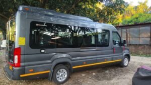 Force Urbania 17 seater luxury van for rent with spacious seating and comfortable travel experience